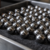 Polished steel spheres arranged in a precision-parts tray
