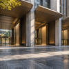 Three unbranded entrance bays beneath a contemporary financial-district arcade in daylight