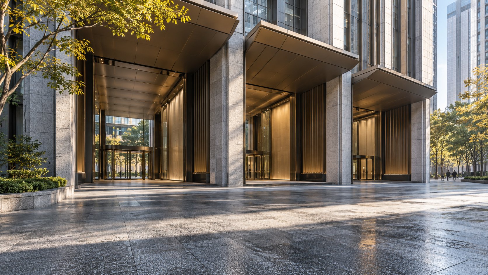 Three unbranded entrance bays beneath a contemporary financial-district arcade in daylight